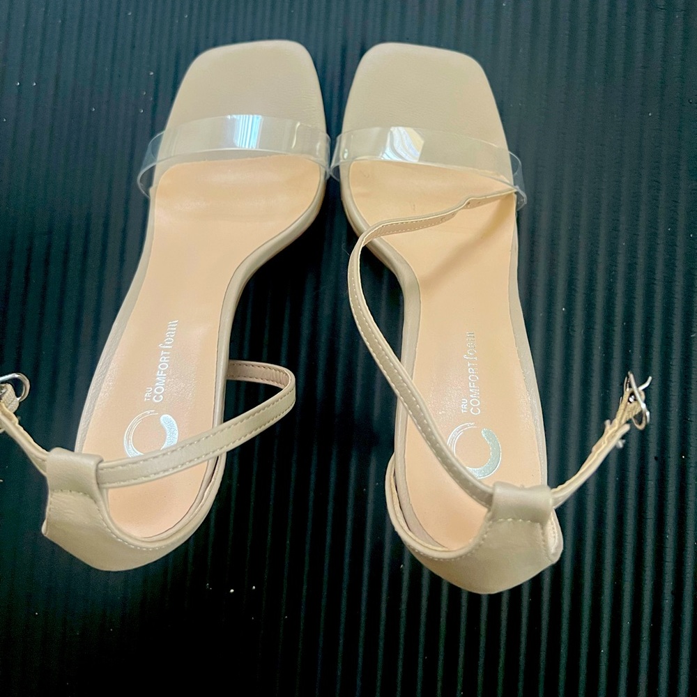 Nude heels with clear toe strap